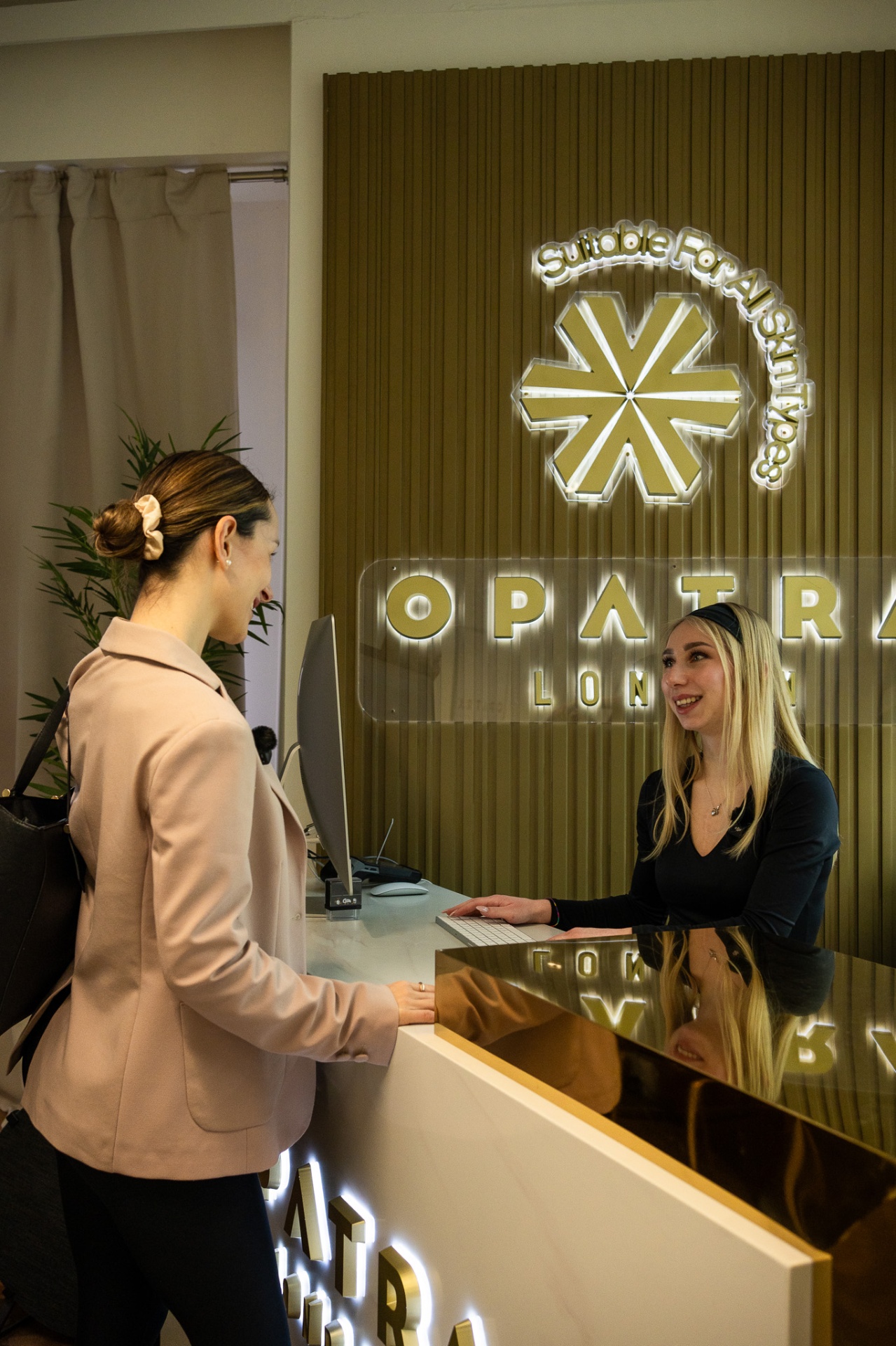 Welcoming client at the Opatra London reception